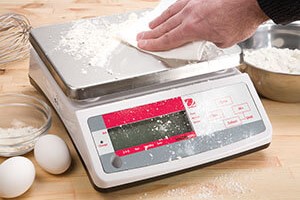 Ohaus Scale Being Cleaned